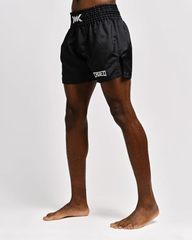 Spodenki Muay Thai Caged Classic – Czarne/Białe