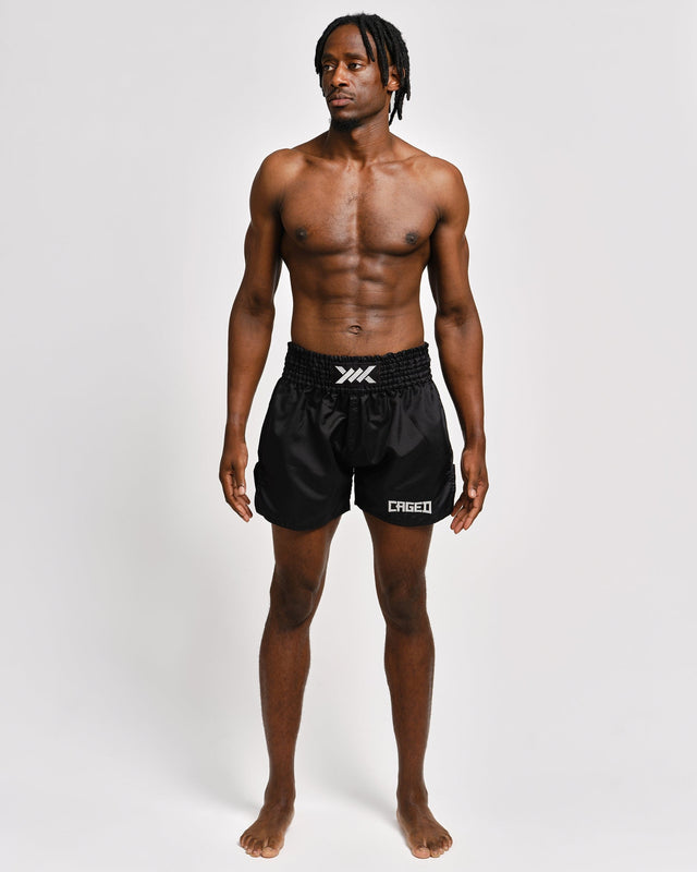 Spodenki Muay Thai Caged Classic – Czarne/Białe