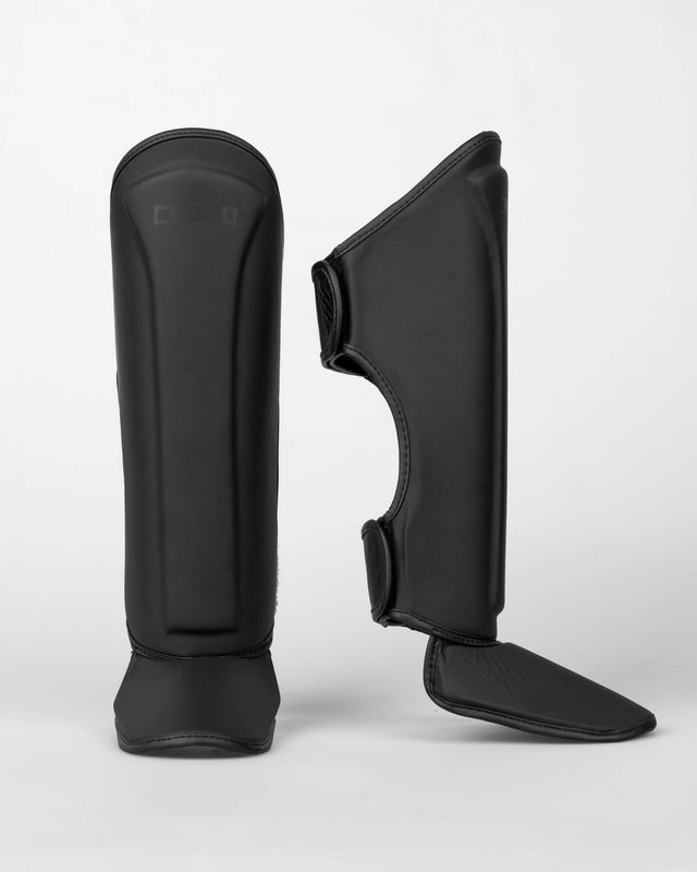 Caged Spark Kids Shin Guards – Matte Black