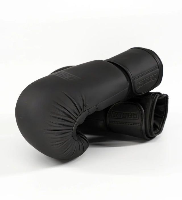 Caged Shadow Bundel Deal – Bokshandschoenen + Scheenbeschermers
