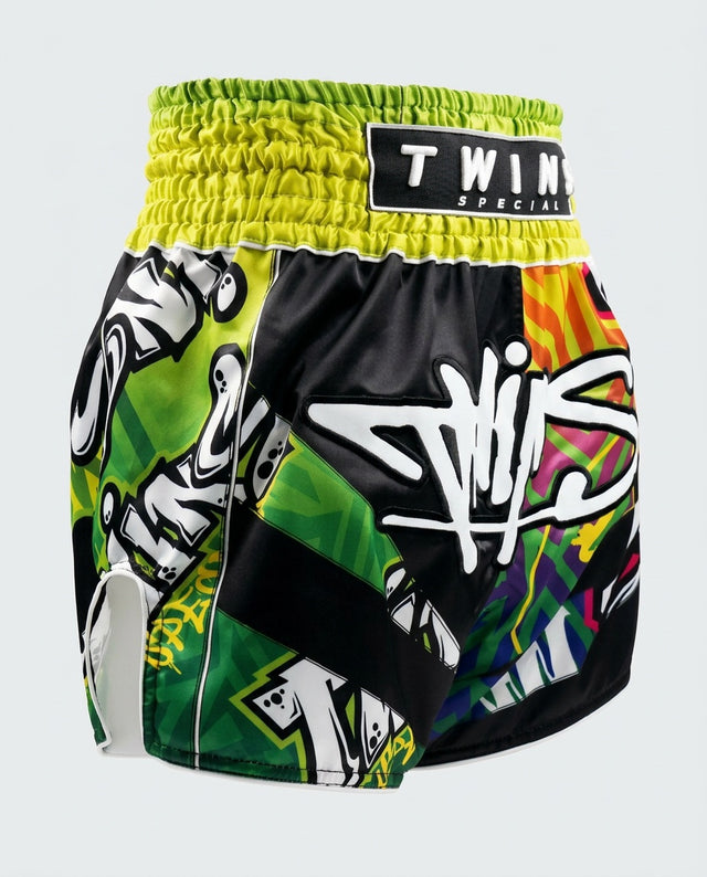 Spodenki Muay Thai Twins TTBL Graffiti – Czarne/Zielone/Żółte