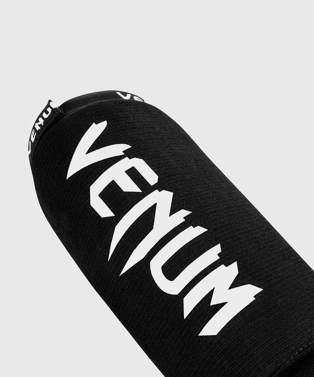 Paratibie Kickboxing Venum Kontact senza piede - Nero/Bianco