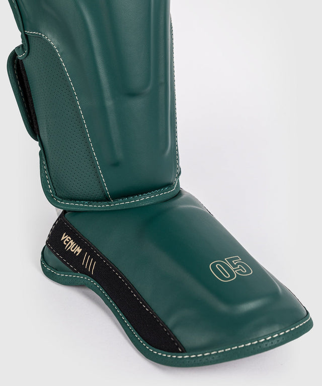 Espinilleras Venum Impact Evo – Verde esmeralda