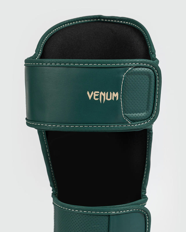 Espinilleras Venum Impact Evo – Verde esmeralda