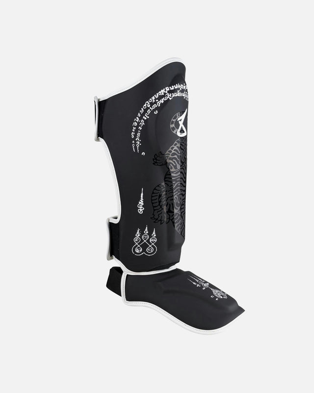 8 WEAPONS Shin guards Sak Yant Big Tiger – Black