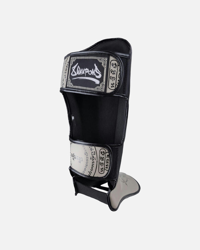 8 WEAPONS Shin guards 8 Ways Yant – Black/Sand