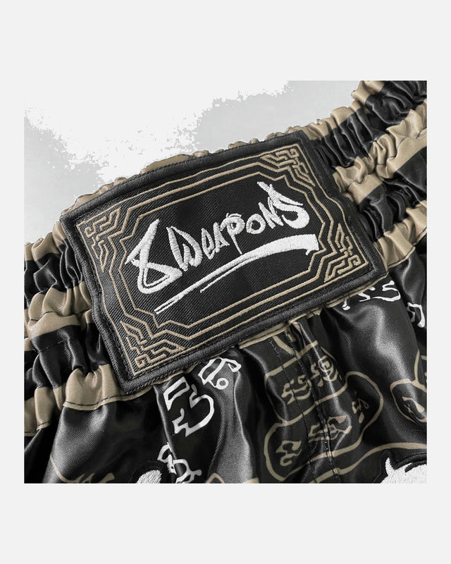 8 WEAPONS Muay Thai Shorts 8 Ways Yant 2.0 – Black/Sand