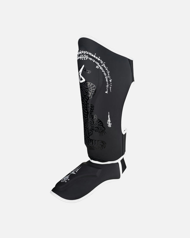 8 WEAPONS Shin guards Sak Yant Big Tiger – Black