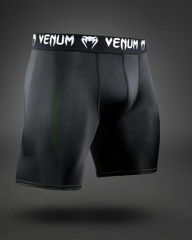 Pantaloni scurți de compresie Venum MX – Negru/Alb