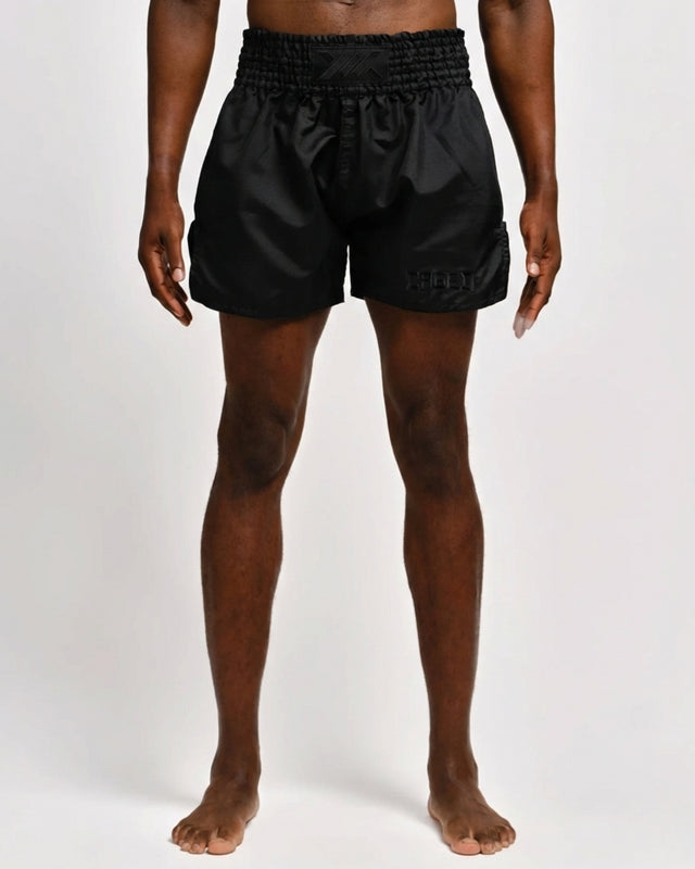 Spodenki Muay Thai Caged Classic – Czarne/Czarne