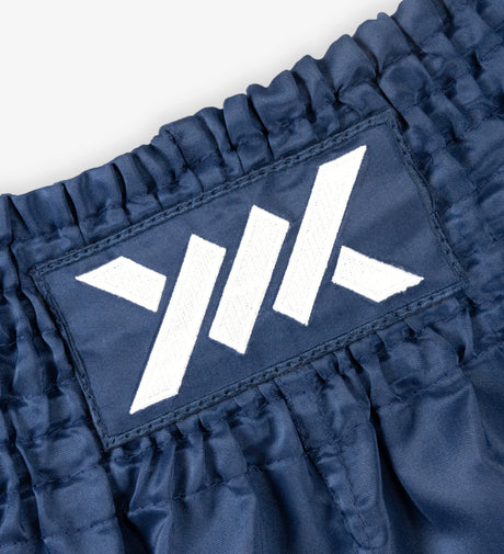 Pantaloni scurți Caged Muay Thai Classic – Albastru închis/Alb femei