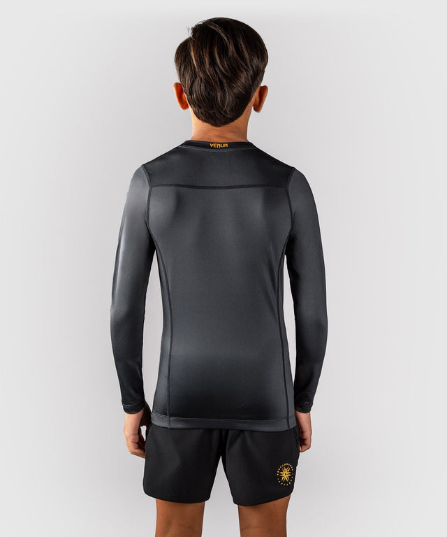 Rashguard Venum Attack Mangas Largas Niños – Negro/Oro