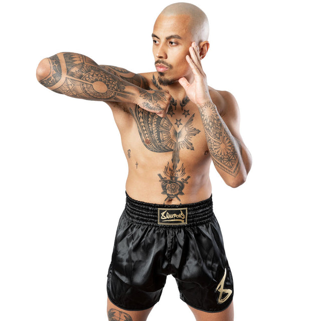 Shorts de Muay Thai 8 WEAPONS Strike – Noir/Or