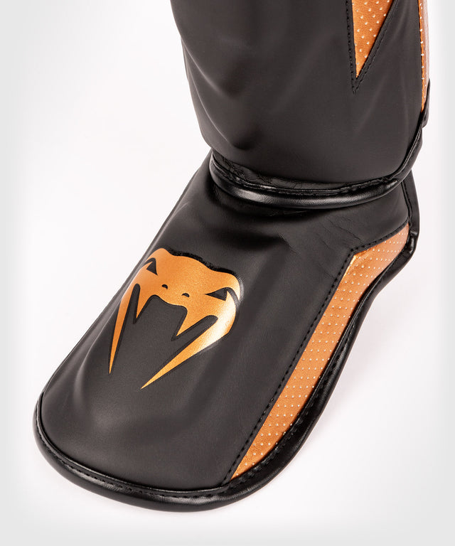 Venum Scheenbeschermers Kickboks Elite Evo - Zwart/Brons
