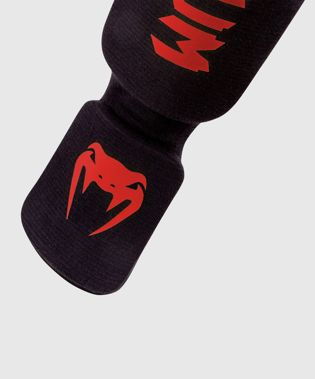 Espinilleras Venum Kontact – Negro/Rojo