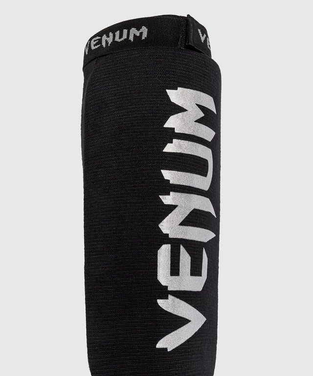 Espinilleras Venum Kontact – Negro/Plata