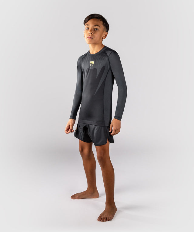 Rashguard Venum Attack Mangas Largas Niños – Negro/Oro